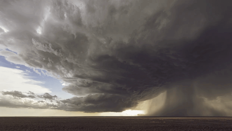 "Dark storm clouds gather in the sky over field" from filmmaker Dustin Farrell. Footage licensed for Netflix's The Dinosaurs.